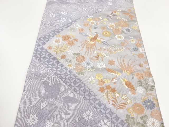  鳳凰に草花・蝶・波模様織出し袋帯